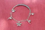 Butterfly dolphin charms bracelet