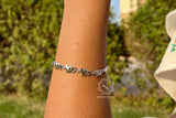 Interlock Heart Rhodium Bracelet